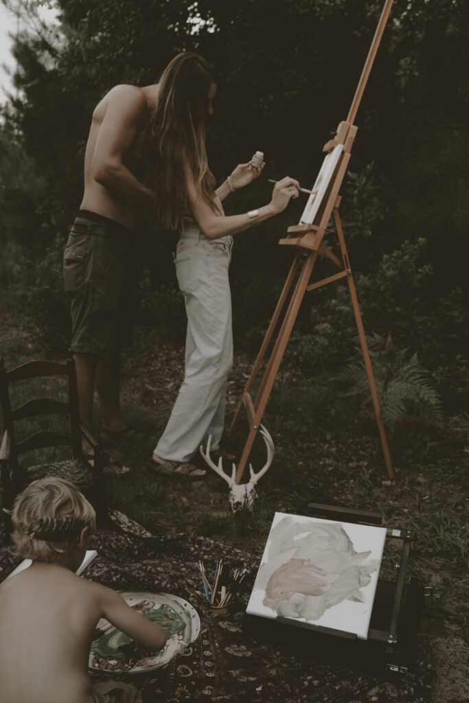 Couple paints together during a documentary style intimate photo session in North Carolina